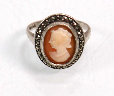 Lot 648 - Twelve silver dress rings including an half...