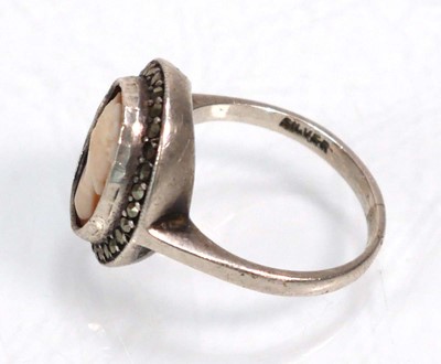 Lot 648 - Twelve silver dress rings including an half...