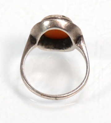 Lot 648 - Twelve silver dress rings including an half...