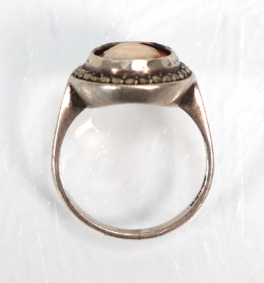 Lot 648 - Twelve silver dress rings including an half...