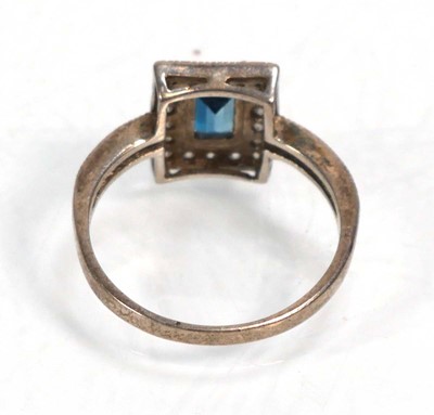 Lot 648 - Twelve silver dress rings including an half...
