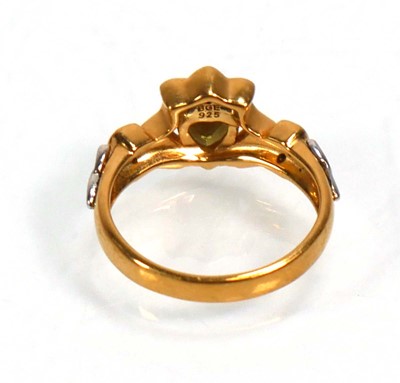 Lot 648 - Twelve silver dress rings including an half...