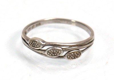 Lot 648 - Twelve silver dress rings including an half...
