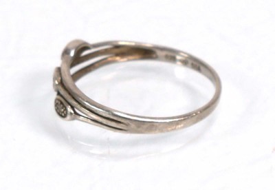 Lot 648 - Twelve silver dress rings including an half...