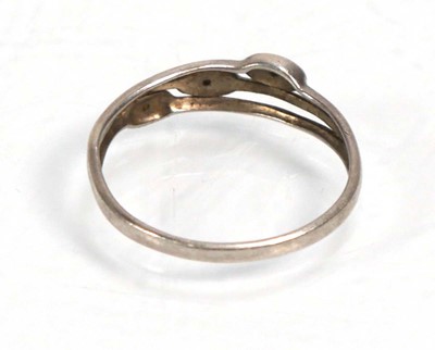 Lot 648 - Twelve silver dress rings including an half...
