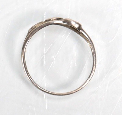 Lot 648 - Twelve silver dress rings including an half...