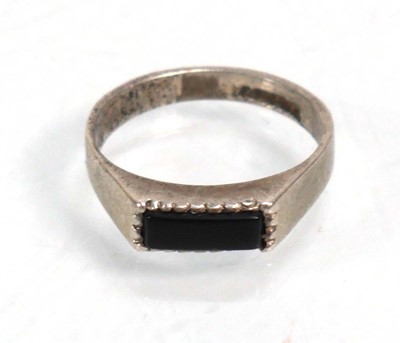Lot 648 - Twelve silver dress rings including an half...