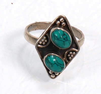 Lot 648 - Twelve silver dress rings including an half...