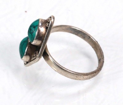Lot 648 - Twelve silver dress rings including an half...