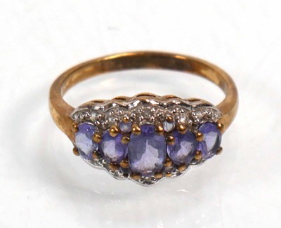 Lot 648 - Twelve silver dress rings including an half...
