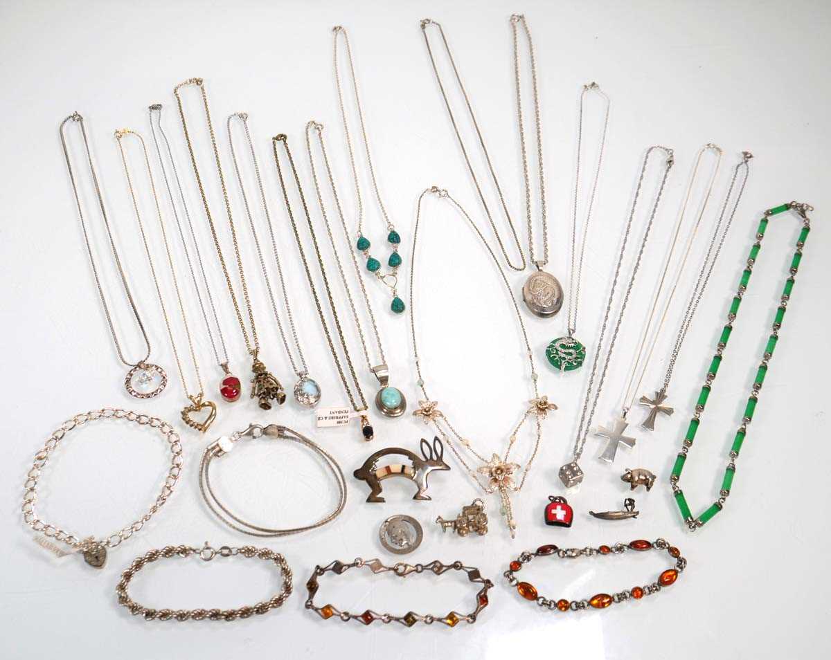 Lot 649 - A group of silver and metalware jewellery...