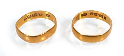 Lot 650 - Two 22ct yellow gold wedding bands, Birmingham...