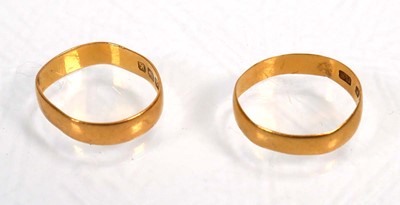 Lot 650 - Two 22ct yellow gold wedding bands, Birmingham...