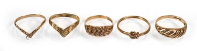 Lot 651 - Five 9ct yellow gold rings including two...