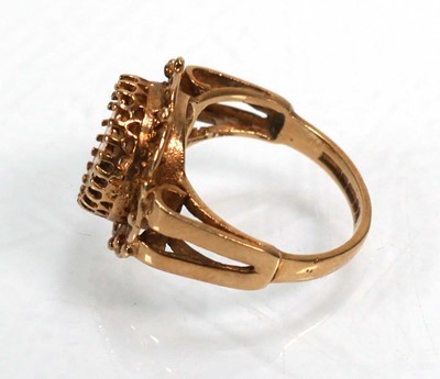 Lot 652 - A 9ct yellow gold ring decorated with a...