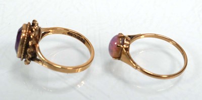 Lot 654 - A 9ct yellow gold ring set opal type stone,...