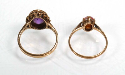 Lot 654 - A 9ct yellow gold ring set opal type stone,...