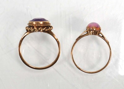Lot 654 - A 9ct yellow gold ring set opal type stone,...