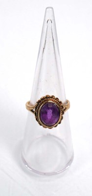 Lot 654 - A 9ct yellow gold ring set opal type stone,...