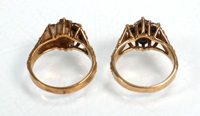 Lot 655 - A pair of 9ct yellow gold cluster rings set...