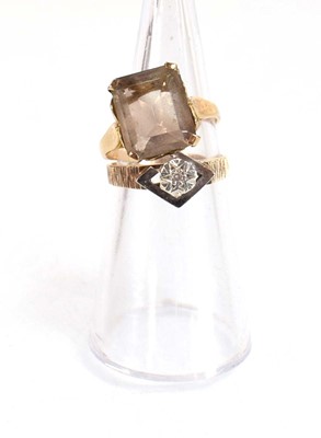 Lot 656 - A 9ct yellow gold ring set smoky quartz, ring...
