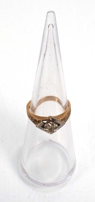 Lot 656 - A 9ct yellow gold ring set smoky quartz, ring...
