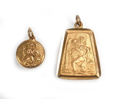 Lot 657 - Two 9ct yellow gold St Christopher pendants,...
