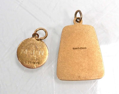 Lot 657 - Two 9ct yellow gold St Christopher pendants,...