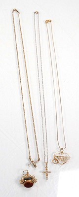 Lot 658 - Three 9ct yellow gold pendant necklaces...