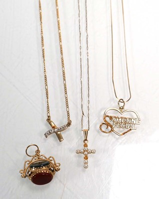 Lot 658 - Three 9ct yellow gold pendant necklaces...