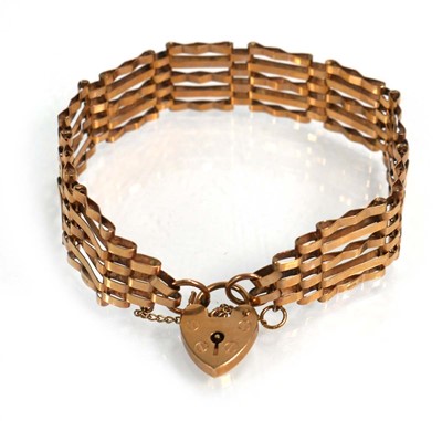 Lot 659 - A 9ct yellow gold five bar gatelink bracelet...