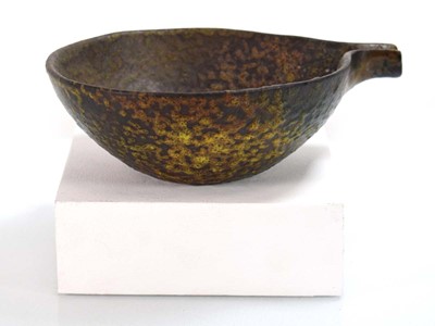 Lot 148 - A Bitossi lava green bowl of organic curved...
