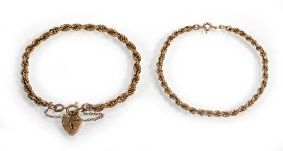 Lot 660 - A 9ct yellow gold ropetwist bracelet with...