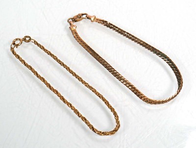Lot 664 - A 9ct yellow gold flat curblink bracelet with...