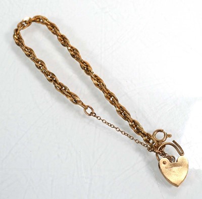 Lot 665 - A 9ct yellow gold fancy ropetwist bracelet...