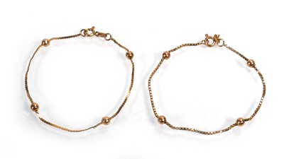 Lot 666 - A pair of 9ct yellow gold box and ball link...