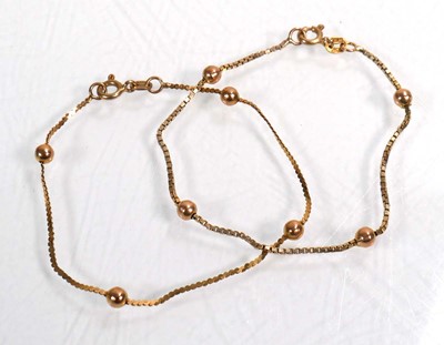 Lot 666 - A pair of 9ct yellow gold box and ball link...