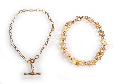 Lot 667 - A 9ct yellow gold openwork starlink bracelet,...