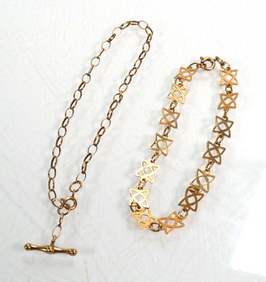 Lot 667 - A 9ct yellow gold openwork starlink bracelet,...