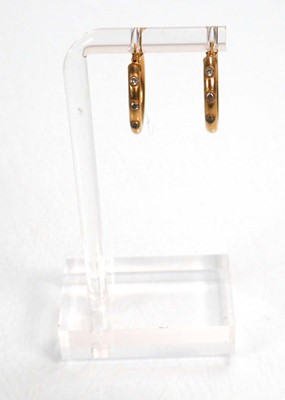 Lot 668 - Six pairs of 9ct yellow gold hoop earrings,...