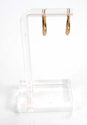 Lot 668 - Six pairs of 9ct yellow gold hoop earrings,...