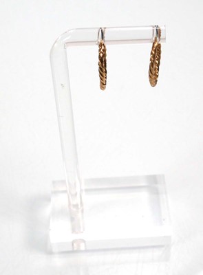 Lot 669 - Six pairs of 9ct yellow gold hoop earrings...