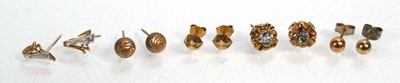 Lot 670 - Five pairs of 9ct yellow gold ear studs,...