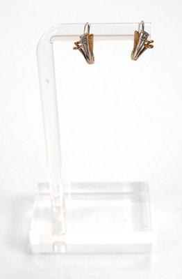 Lot 670 - Five pairs of 9ct yellow gold ear studs,...