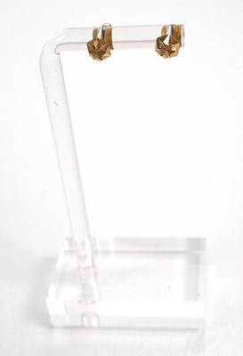 Lot 670 - Five pairs of 9ct yellow gold ear studs,...