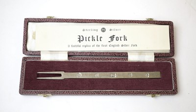 Lot 330 - A cased silver pickle fork, 'A faithful...