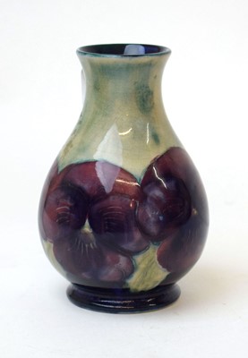 Lot 204 - A William Moorcroft (Burslem) pottery vase...