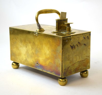 Lot 106 - A Georgian brass tavern 'honesty' tobacco box...