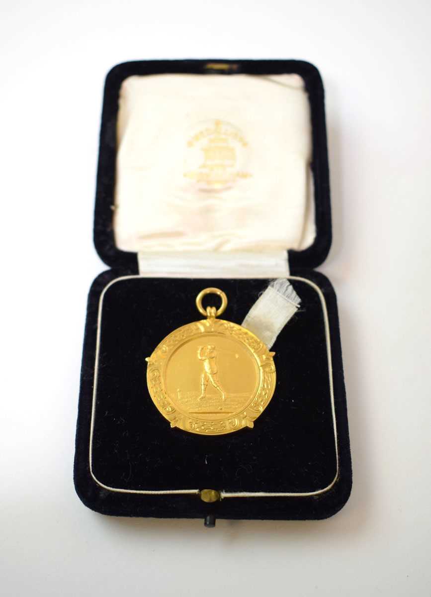 Lot 460 - A 15ct gold golfing medal inscribed 'RB 1896',...