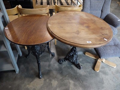 Lot 1016 - 2 circular bar tables with wooden surfaces...